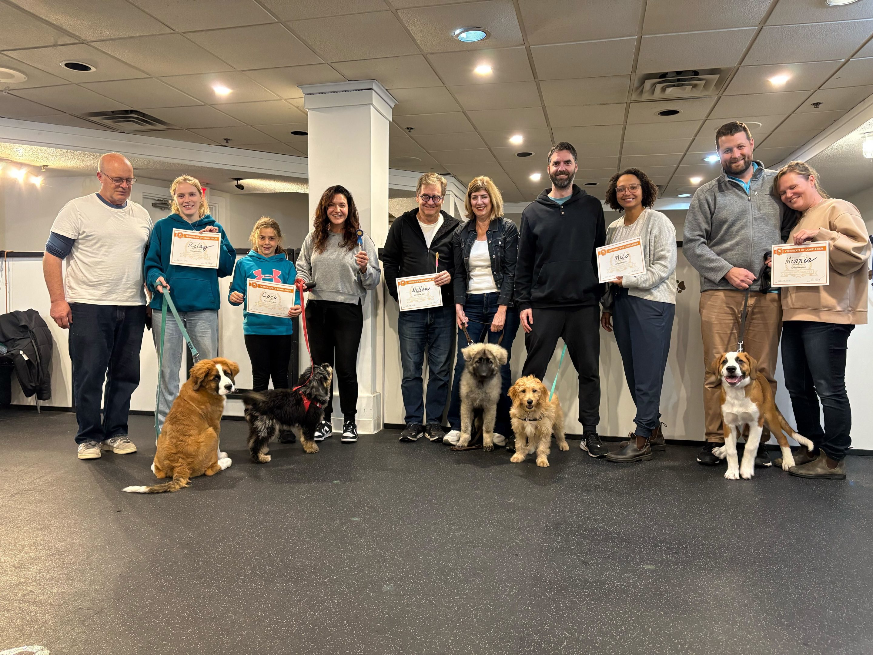 Graduation Photo of Students at When Hounds Fly - Dogs and Puppies